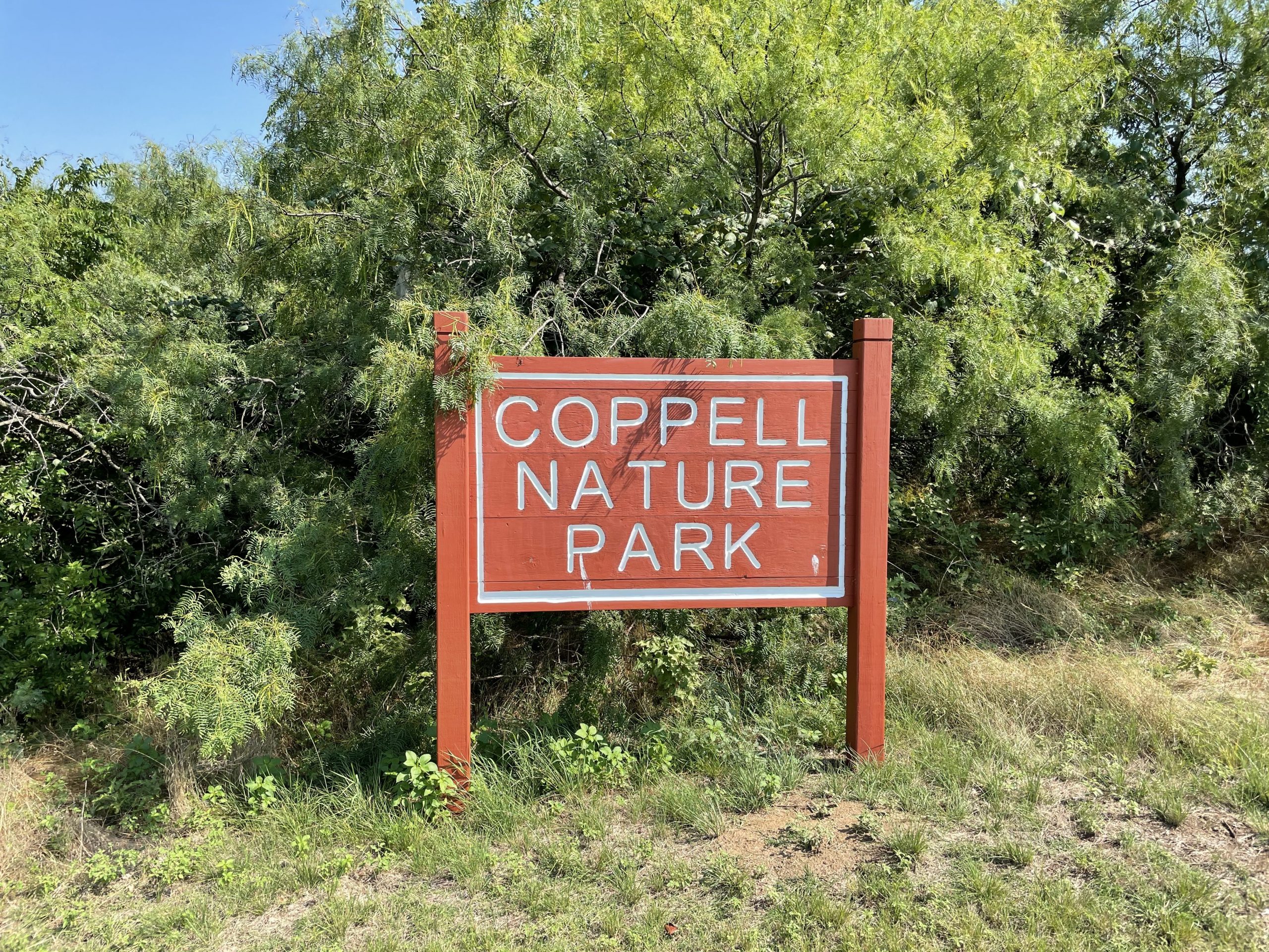 Coppell nature park trail sign hiking north texas trails