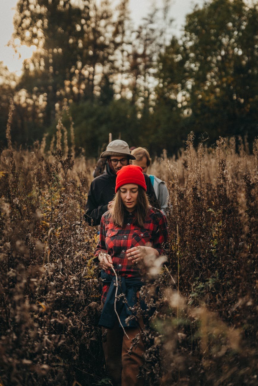 friends hiking off road in autumn